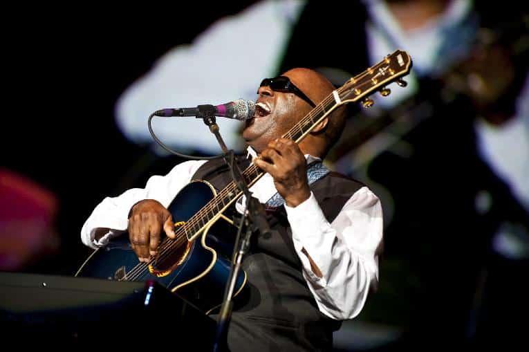 Ellis-Hall-playing-guitar-singing